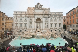 Rome’s Trevi Fountain reopens to limited crowds after three months of cleaning, as authorities mull entry fee